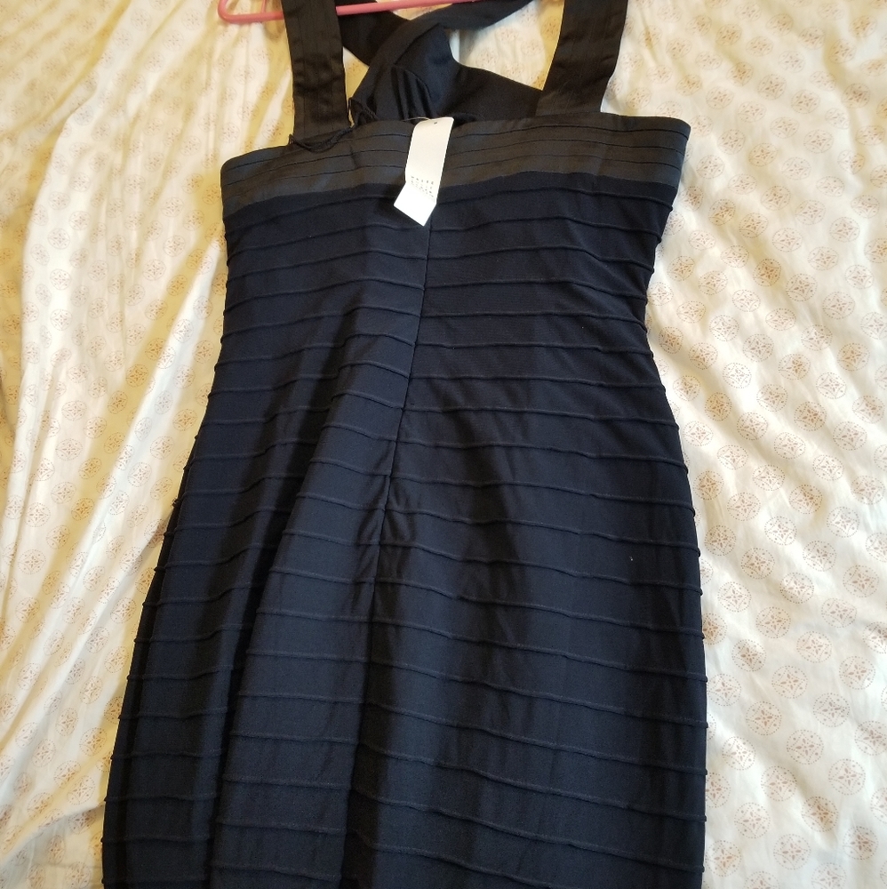 Whitehouseblackmarket Navy blue stretch dress size 8. Brand new never worn.